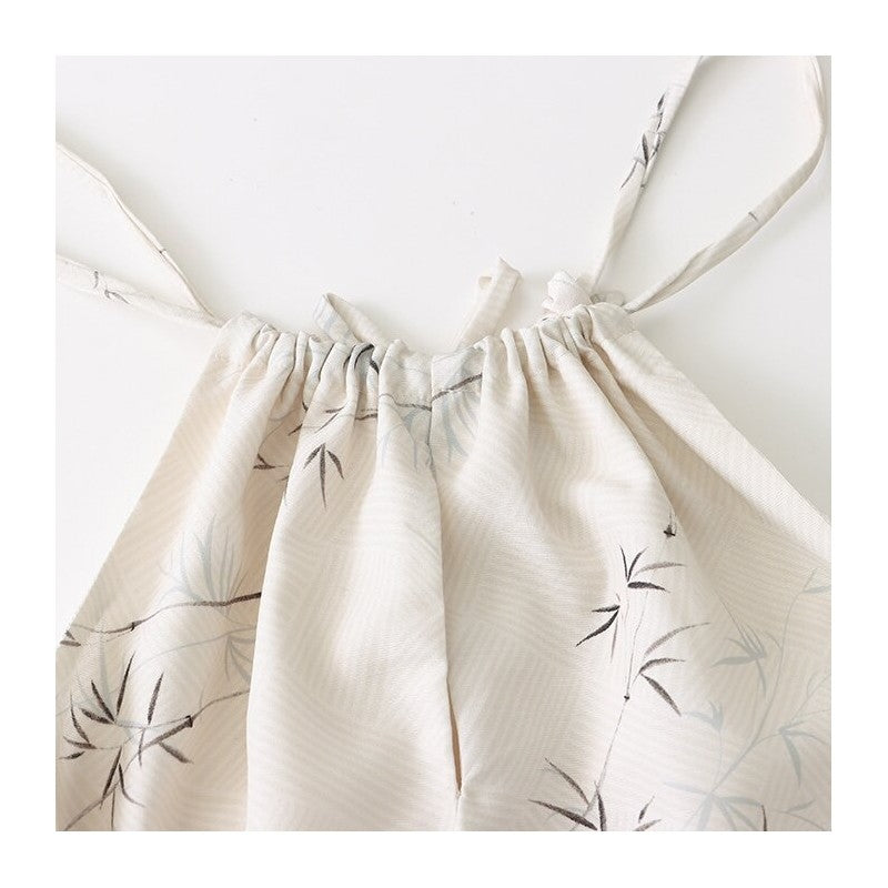 Sure! Here is an optimized title for your clothing product in English:

"Bamboo Fringed Hem Halterneck Maxi