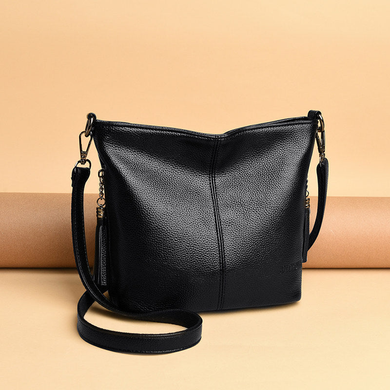 Women's High-Capacity Tassel Crossbody Bag – Leather Bucket Bag with Zipper Pocket