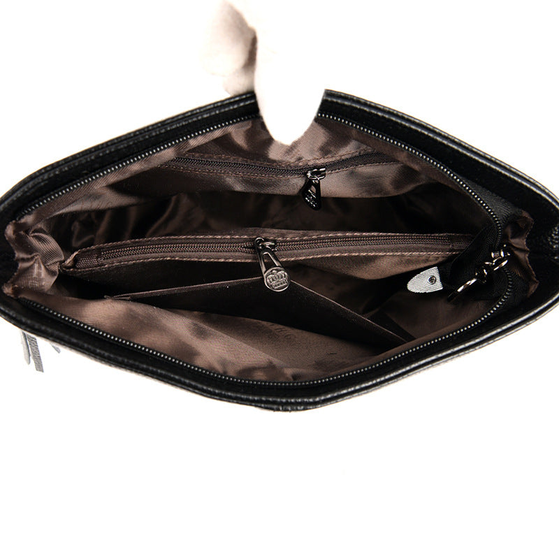 Women's High-Capacity Tassel Crossbody Bag – Leather Bucket Bag with Zipper Pocket