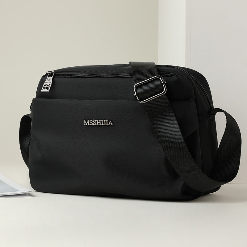Women's Casual Multi-Compartment Crossbody Bag – Fabric Shoulder Bag with Patchwork Detail