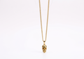 Skull Charm Necklace - Daring Statement Piece with Unique Design