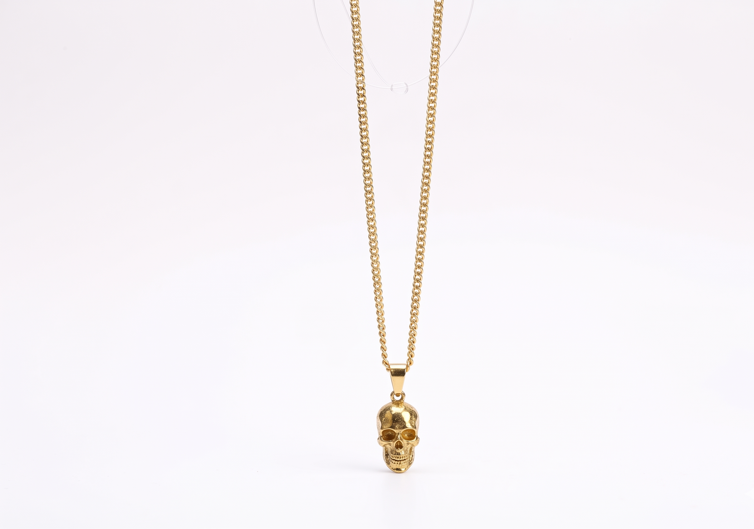 Skull Charm Necklace - Daring Statement Piece with Unique Design