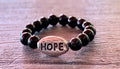 Hope Handmade Expandable Rings in Tourmaline, Obsidian, Cats Eye, and Wood