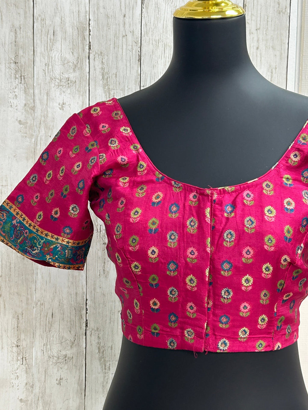 Silk blouse with teal blue detailing