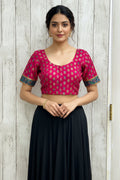 Silk blouse with teal blue detailing