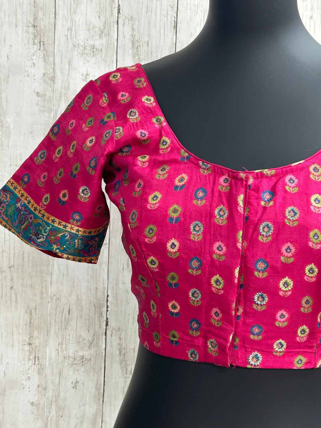 Silk blouse with teal blue detailing