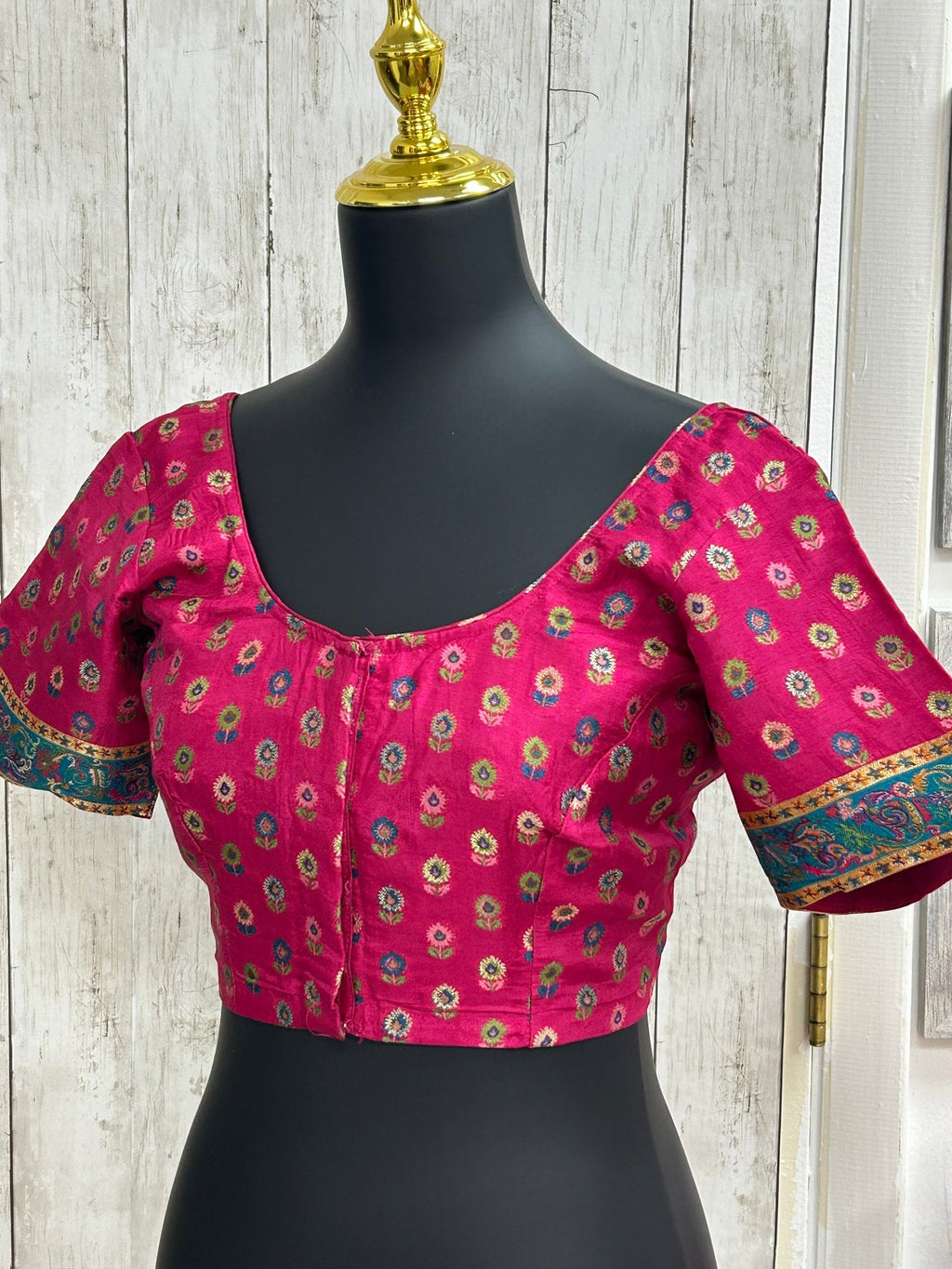 Silk blouse with teal blue detailing