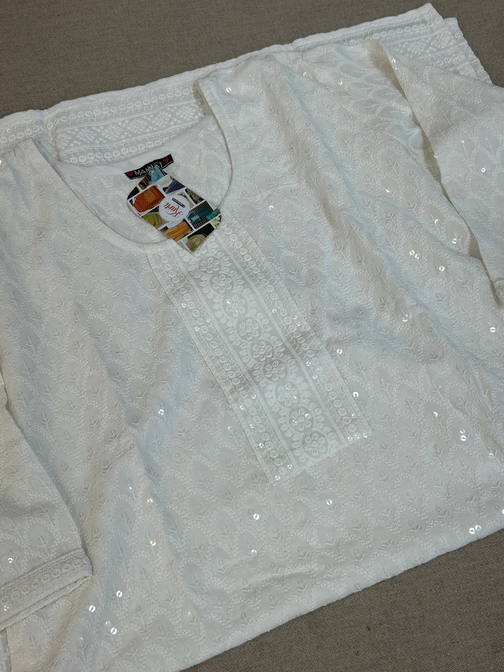 White chikankari kurti with light sequin work