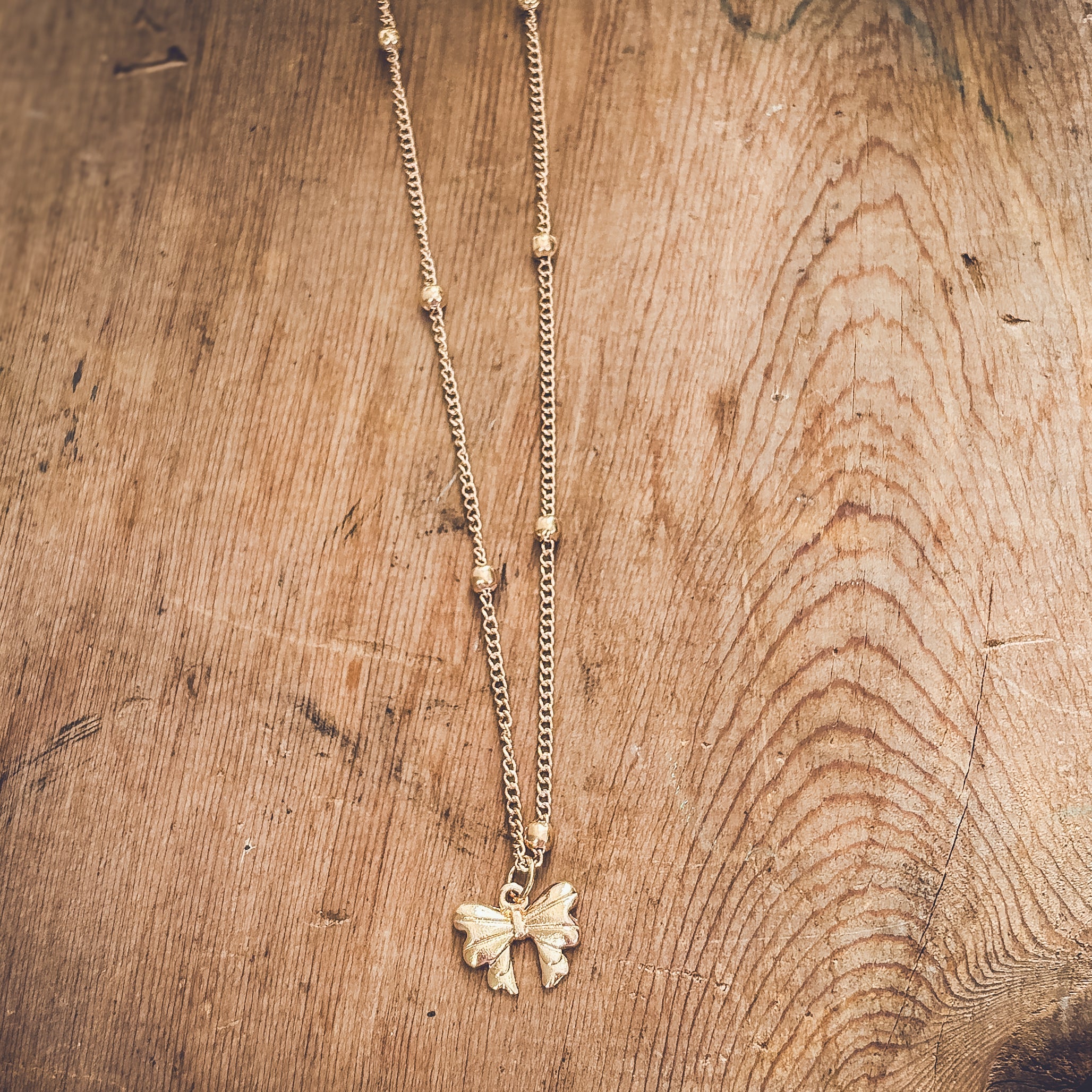 Adorable Gold Bow Necklace
