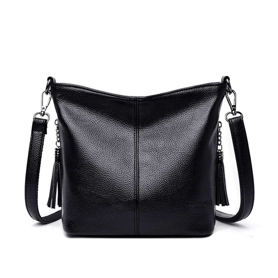 Women's High-Capacity Tassel Crossbody Bag – Leather Bucket Bag with Zipper Pocket
