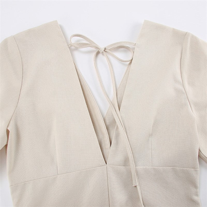 Sure! Here is an optimized title for your clothing product in English:

"Chic V-Neck Dress with Backless