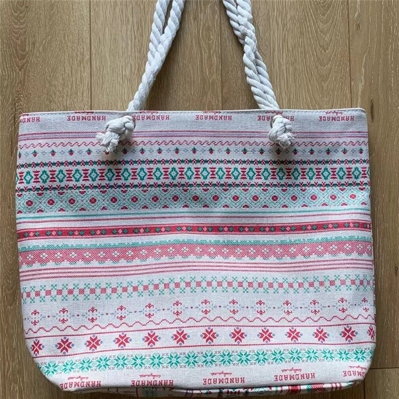 Chic Canvas Tote with Spacious Design and Printed Detail