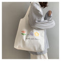 Stylish One-Shoulder Canvas Bag Featuring Vibrant Orange Fruit Print