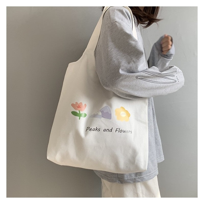 Stylish One-Shoulder Canvas Bag Featuring Vibrant Orange Fruit Print