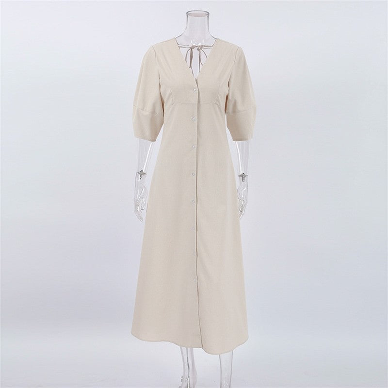Sure! Here is an optimized title for your clothing product in English:

"Chic V-Neck Dress with Backless