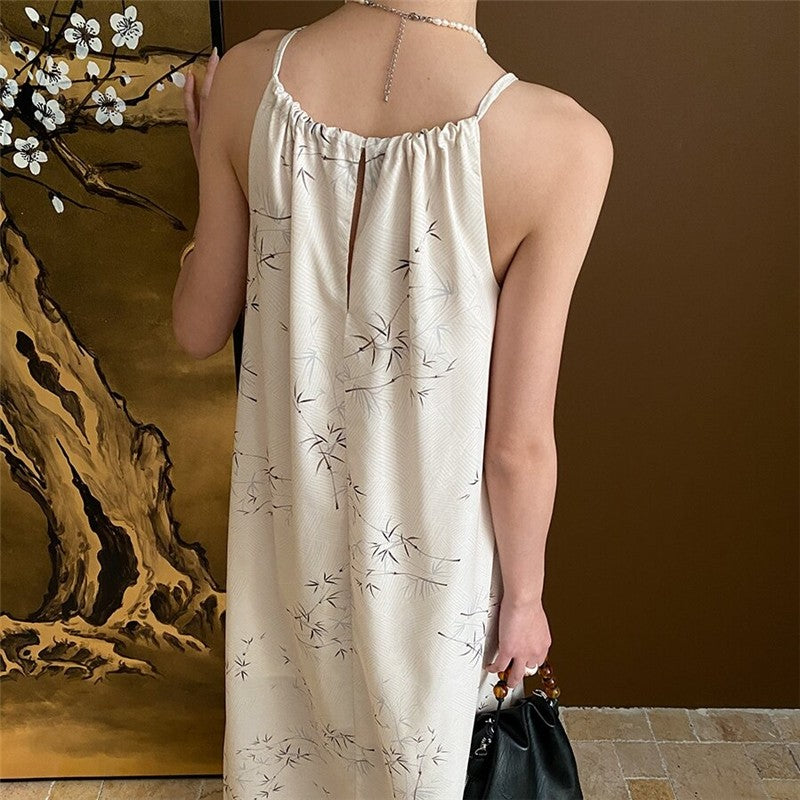 Sure! Here is an optimized title for your clothing product in English:

"Bamboo Fringed Hem Halterneck Maxi