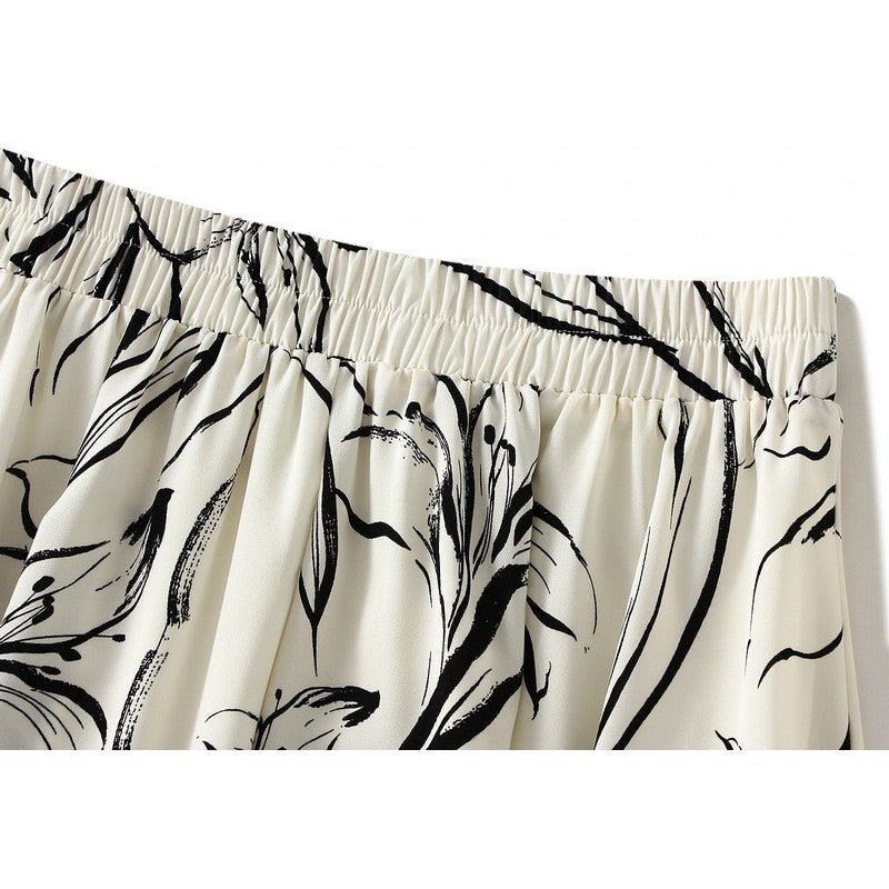 Sure! Here is an optimized title for your clothing product:

"Printed A-Line Skirt with Elastic Waistband