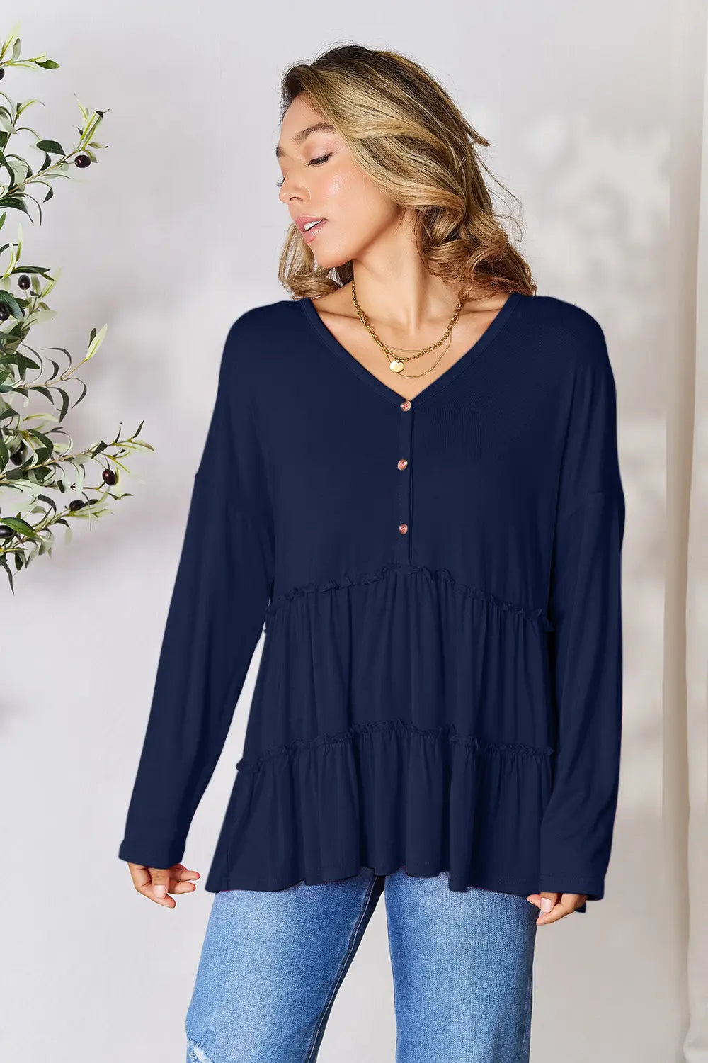 I am a Fashion Junky Take Half Button Long Sleeve Ruffle Hem Blouse