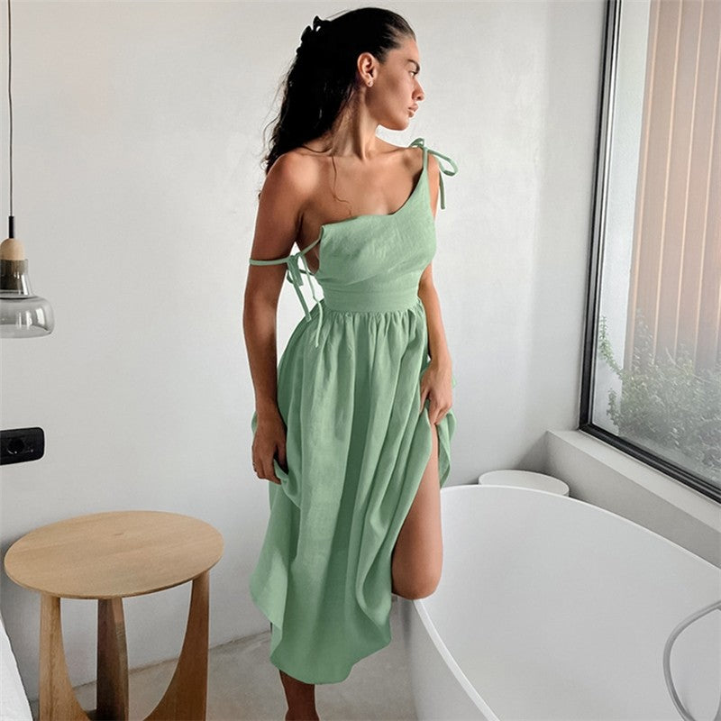 Sure! Here is an optimized title for your clothing product:

"Sleek Cut-Out Sleeveless Bodycon Cami Dress