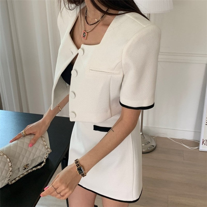 Stylish Ensemble featuring Color-Blocked Jacket and A-Line Skirt