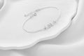 Angel Wing Initial Bracelet - Personalized Elegance for a Meaningful Connection