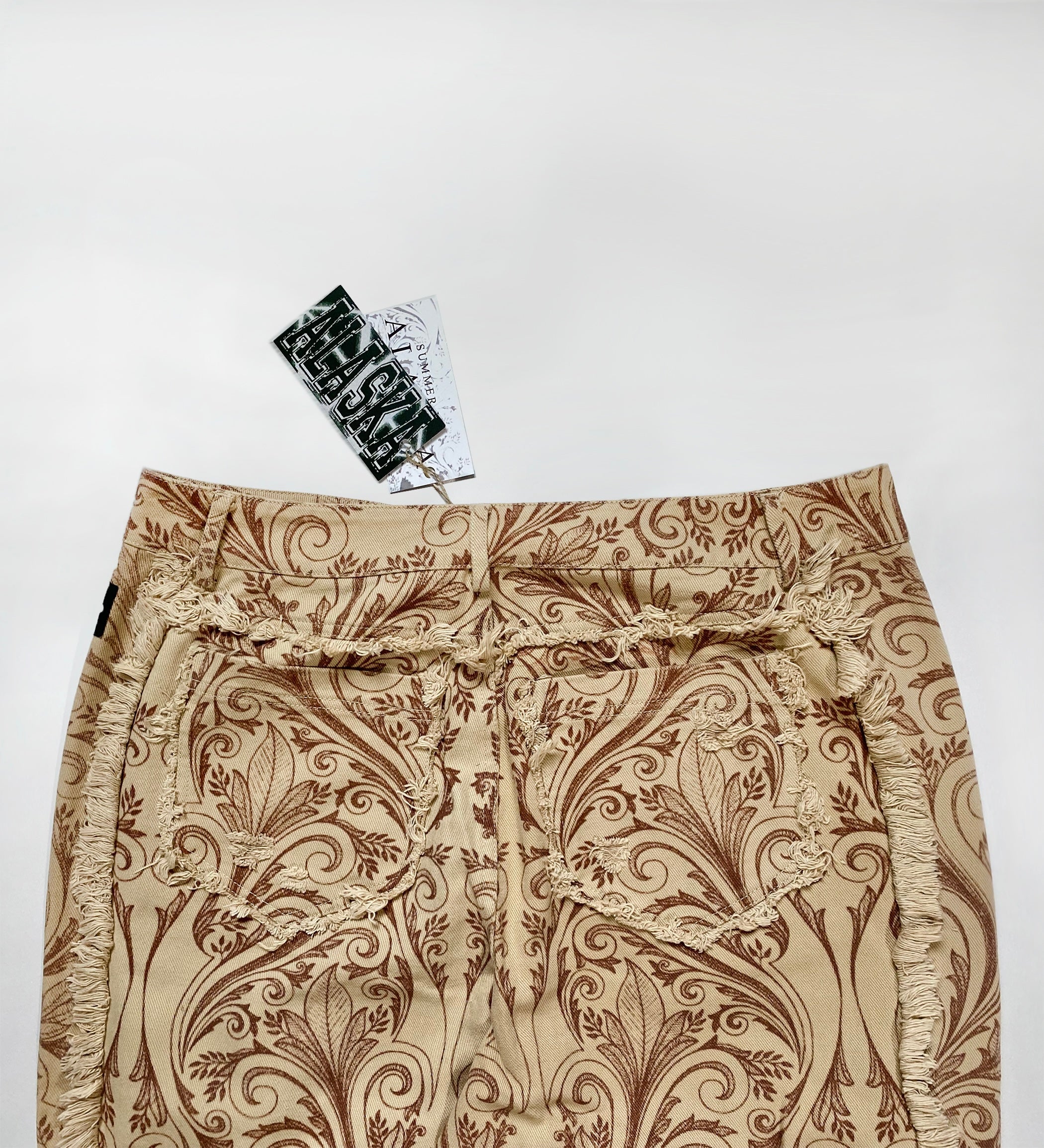 TAN FLORAL SCAV DENIM