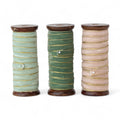 Velvet Ribbon with Gold Edges on Wood Spool